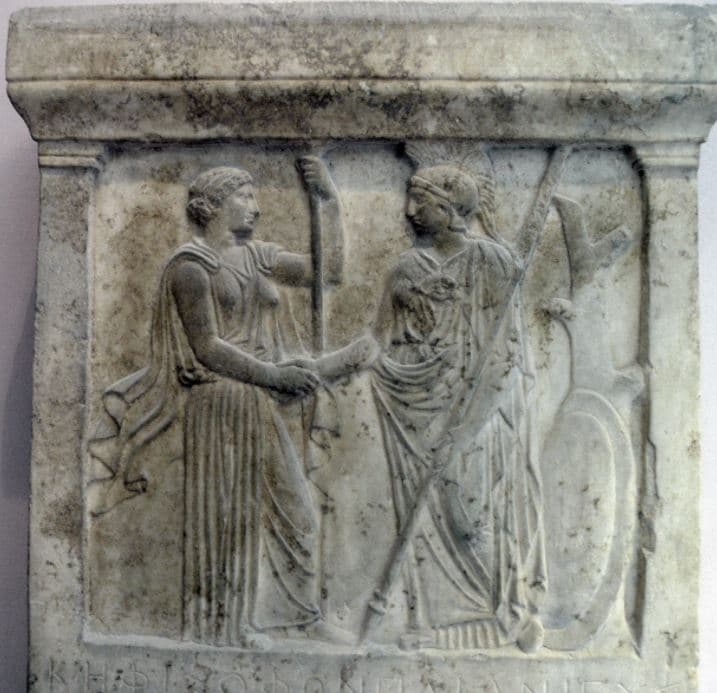 Athena and Hera shaking hands.