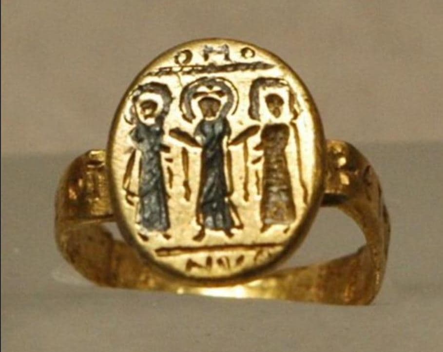 Early Christian wedding ring with an engraving depicting Christ uniting husband and wife.