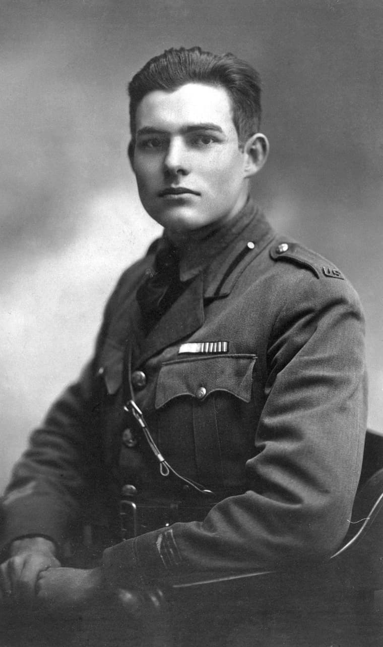 A 1918 portrait photograph of a young Ernest Hemingway in uniform.
